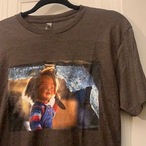 Creepy Chucky Tee. Soft Short Sleeved TriBlend. Graphic is 10.5” x 7”. DTG.